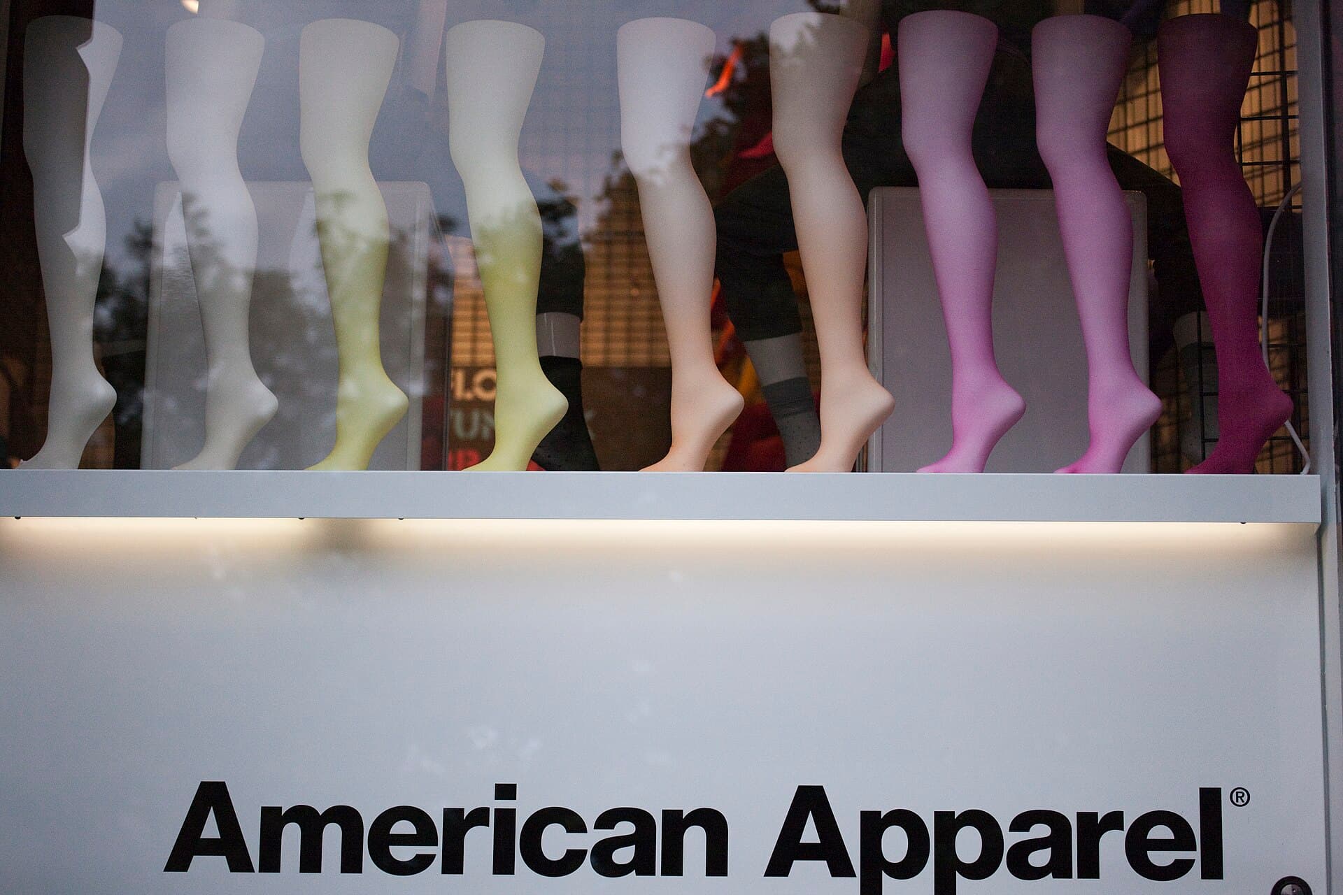 Apparel manufacturing line with operators at sewing machines