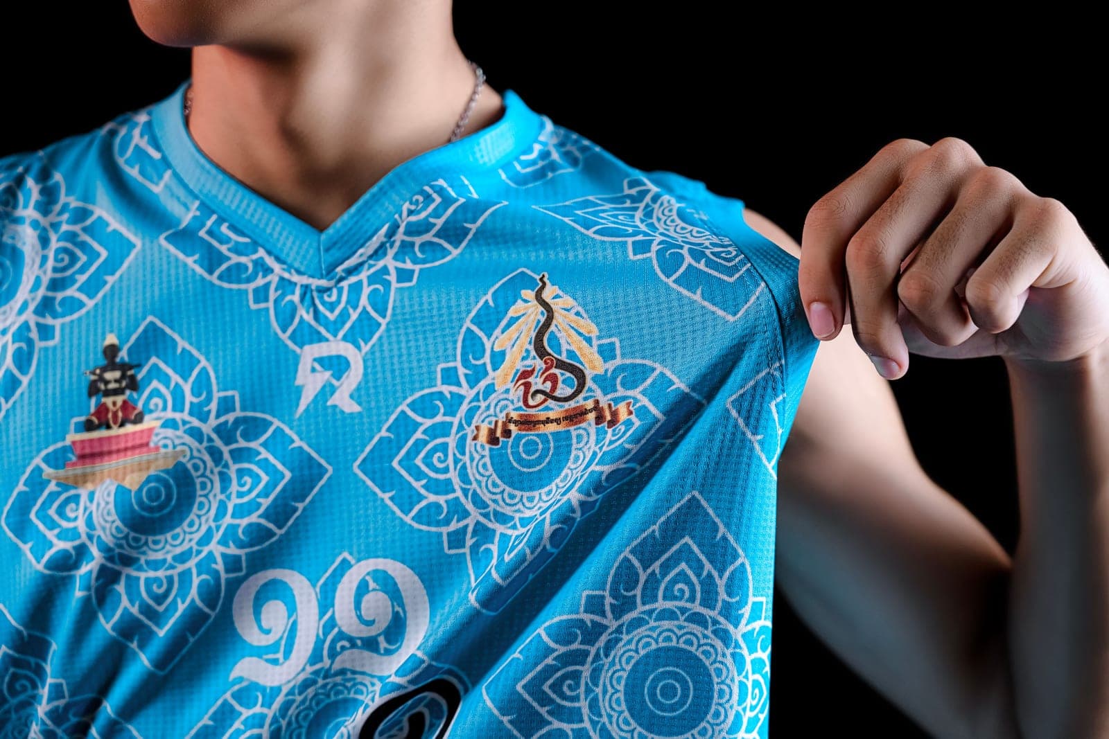 All-over patterned blue sports jersey produced by dye sublimation printing on polyester