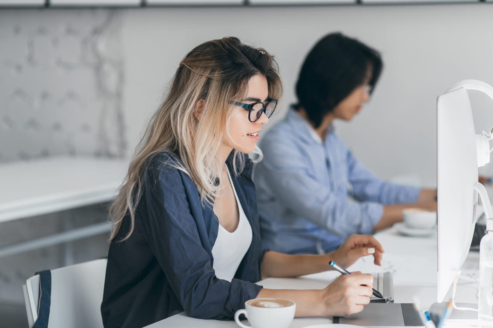 Working on accounts and business software at a computer