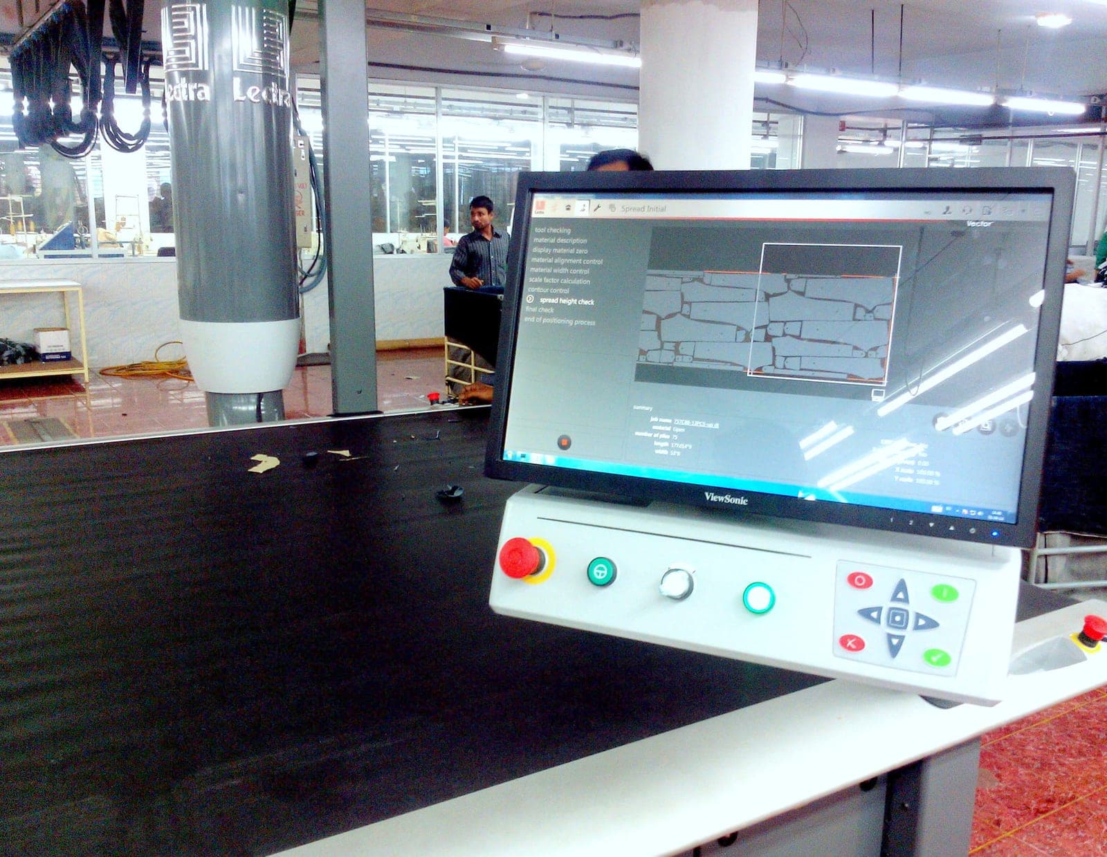 Textile software in use on a computer inside a textile mill